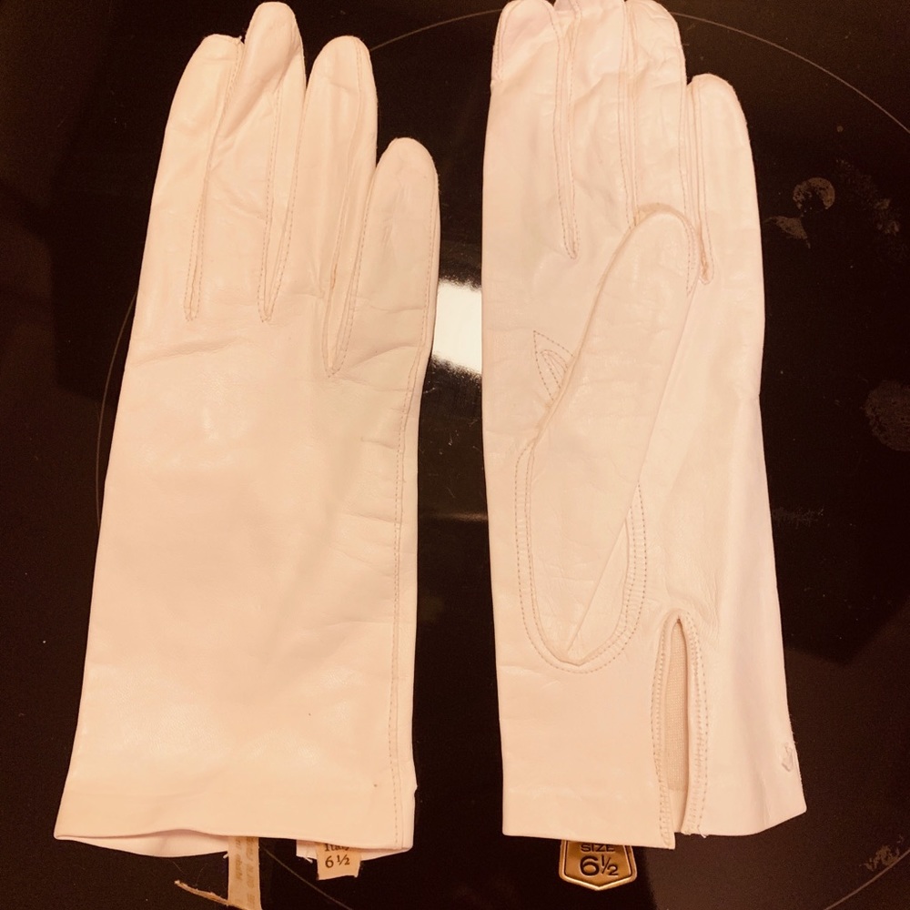 Cream colored Italian leather gloves.